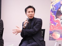 富張周一郎氏